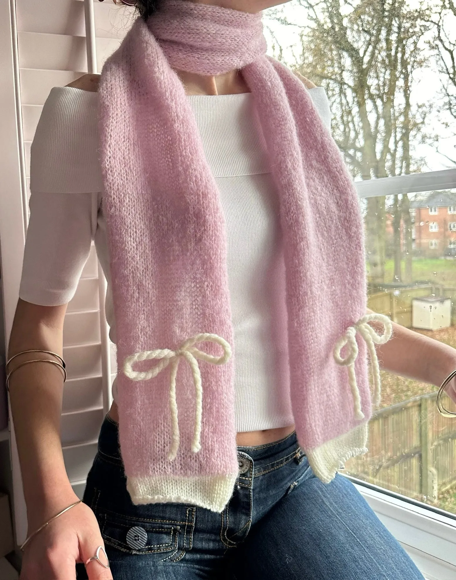 Handmade knitted baby pink and cream mohair bow scarf