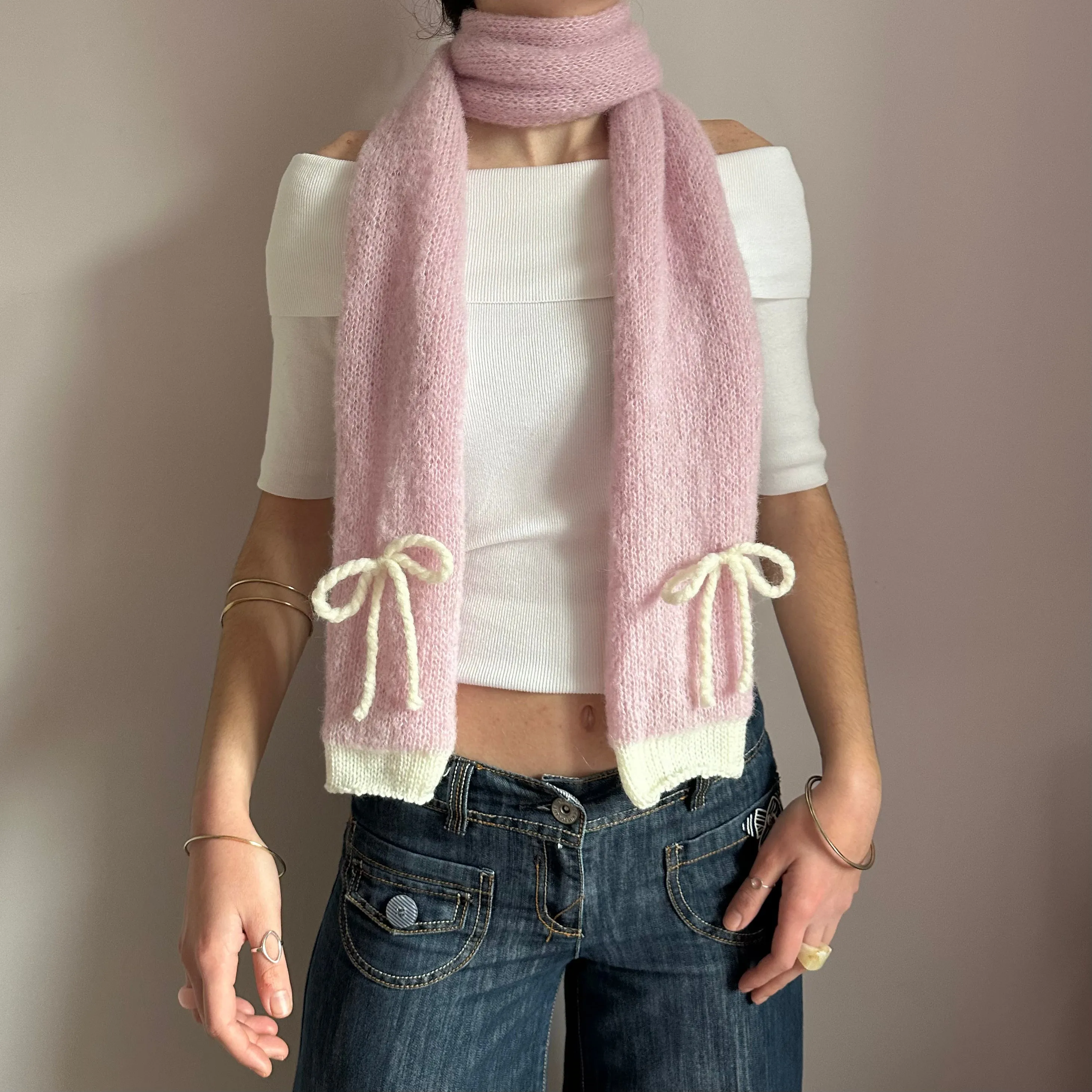 Handmade knitted baby pink and cream mohair bow scarf