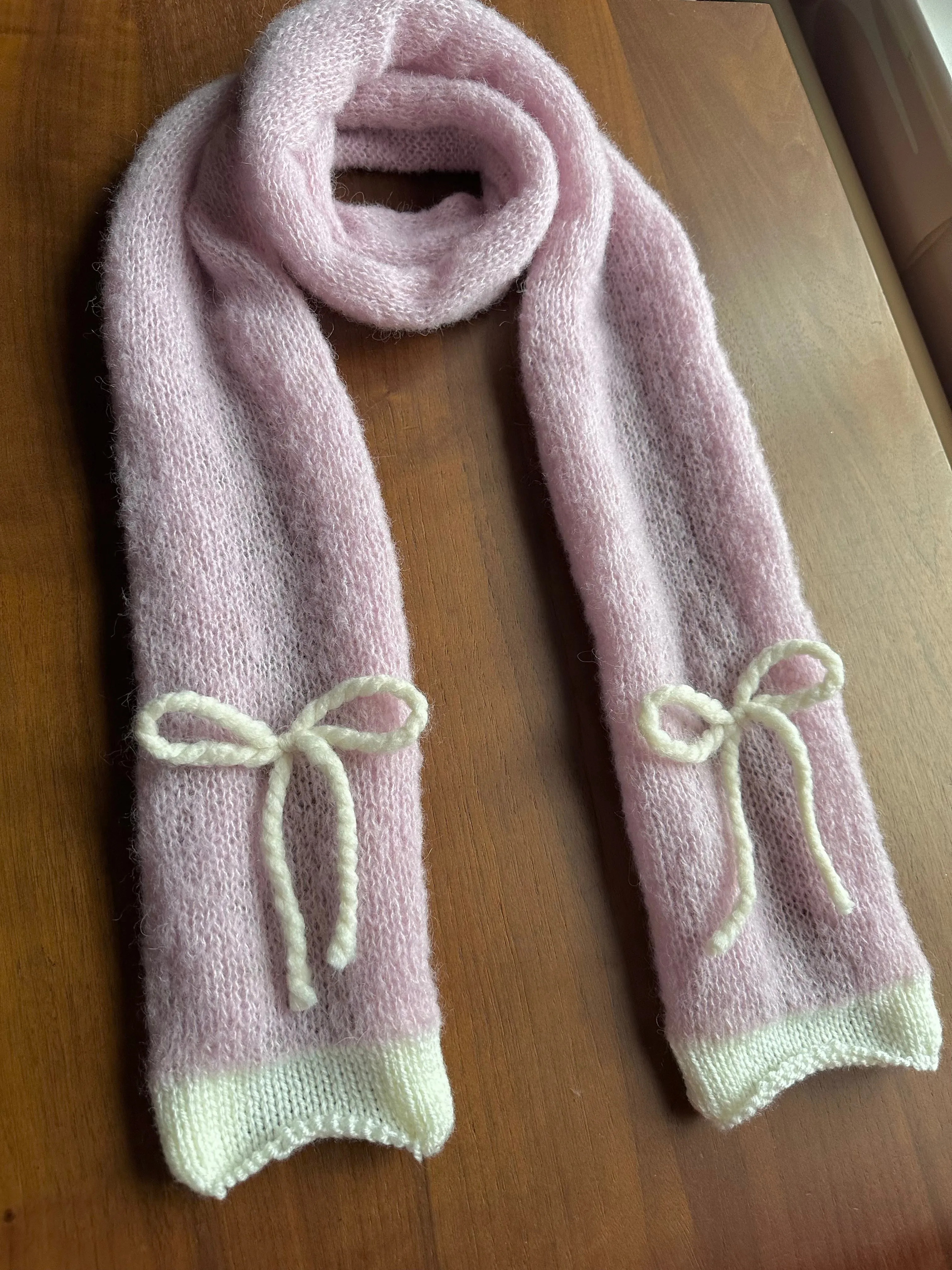 Handmade knitted baby pink and cream mohair bow scarf