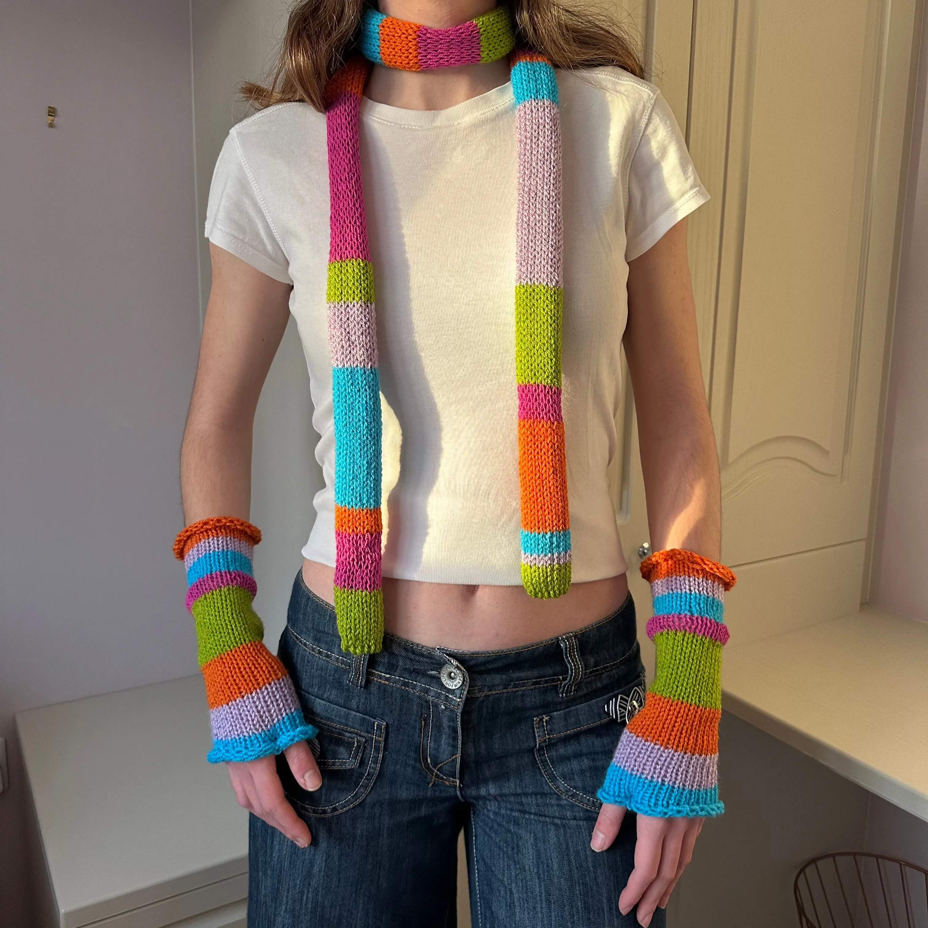 Handmade knitted rainbow striped hand warmers