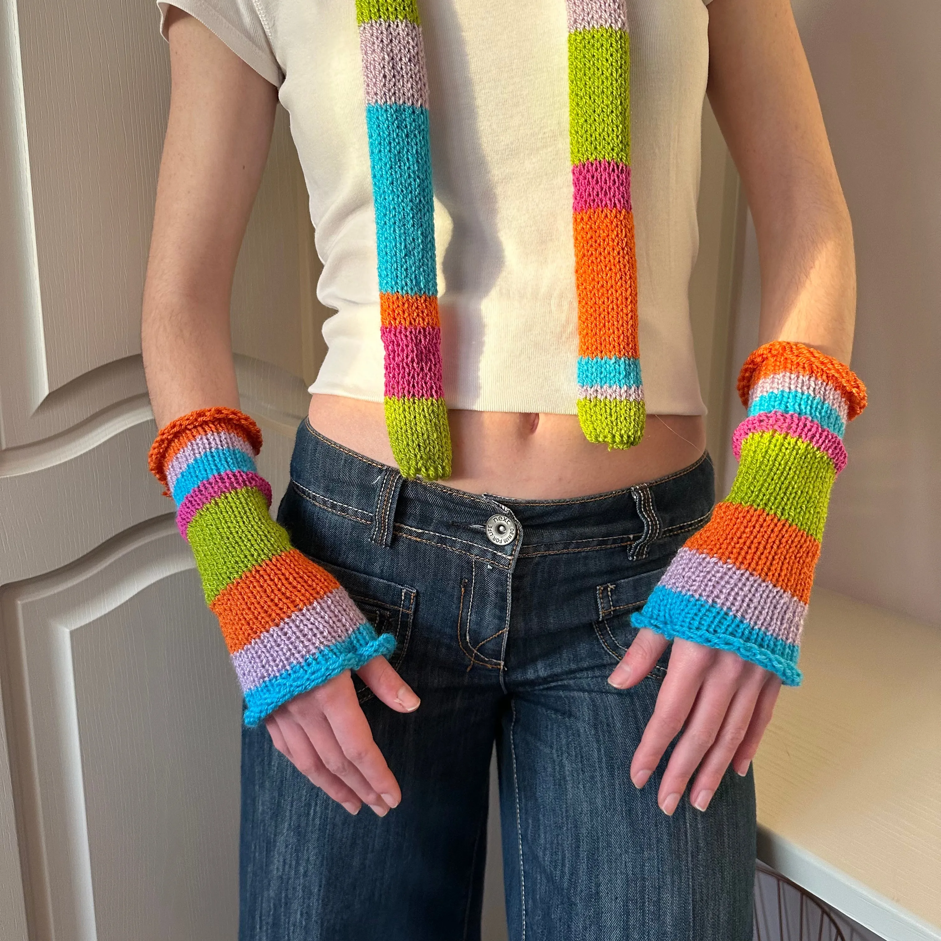 Handmade knitted rainbow striped hand warmers