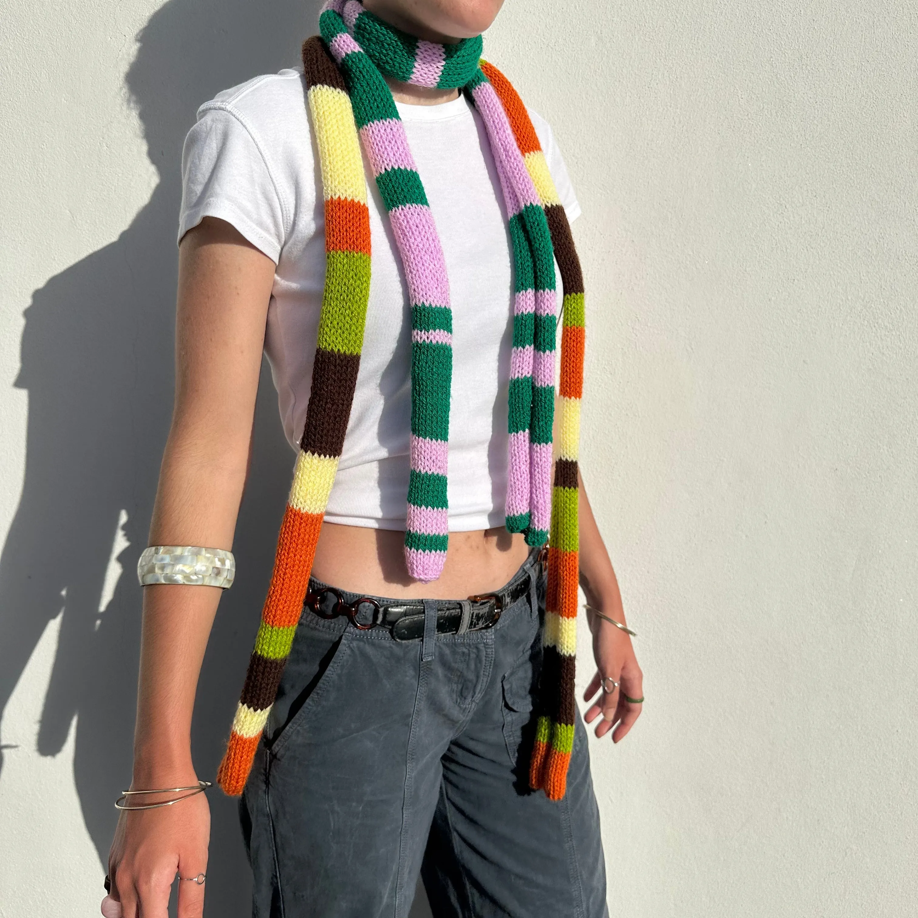 The Linea Scarf - handmade knitted stripy skinny scarf in orange, brown green and yellow