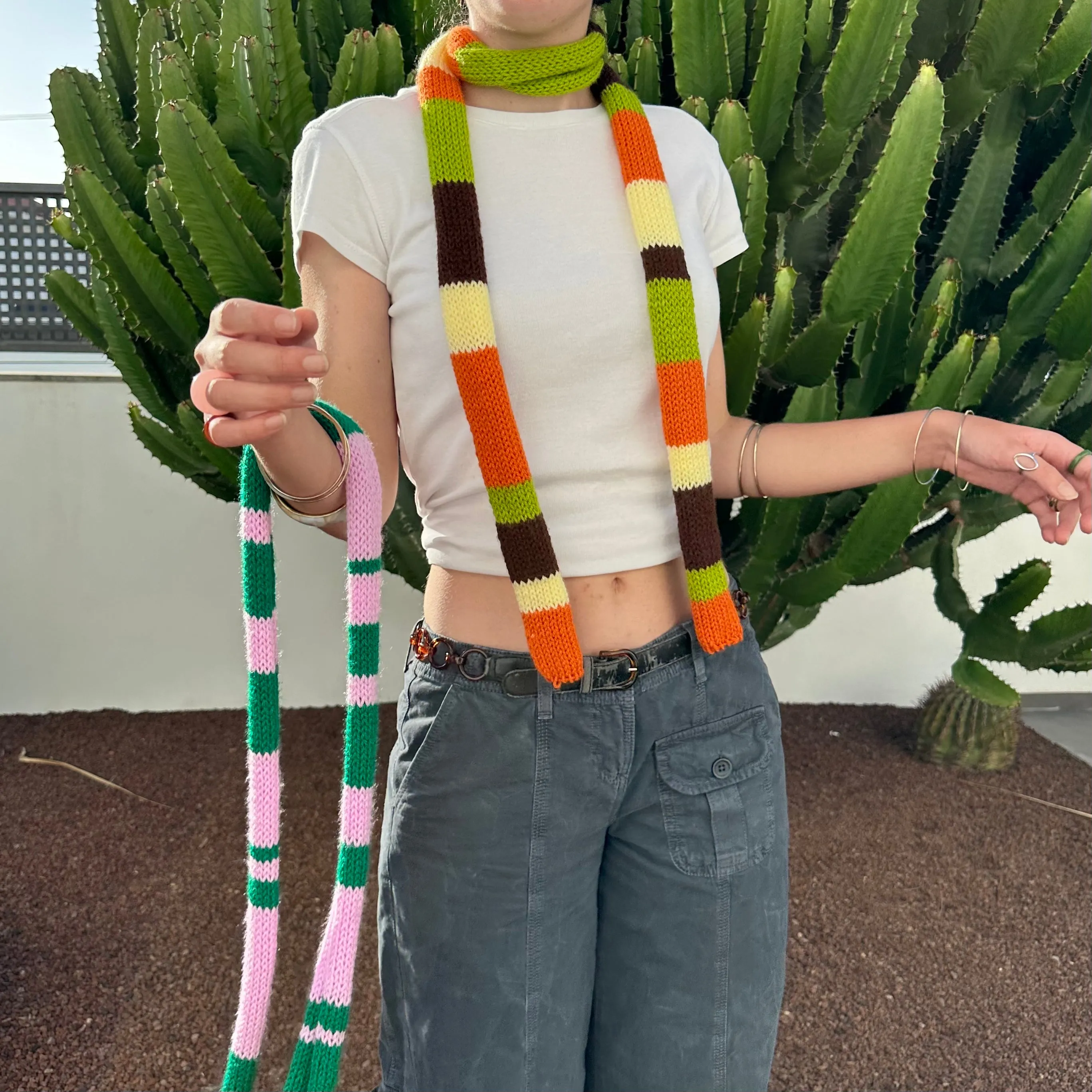 The Linea Scarf - handmade knitted stripy skinny scarf in orange, brown green and yellow